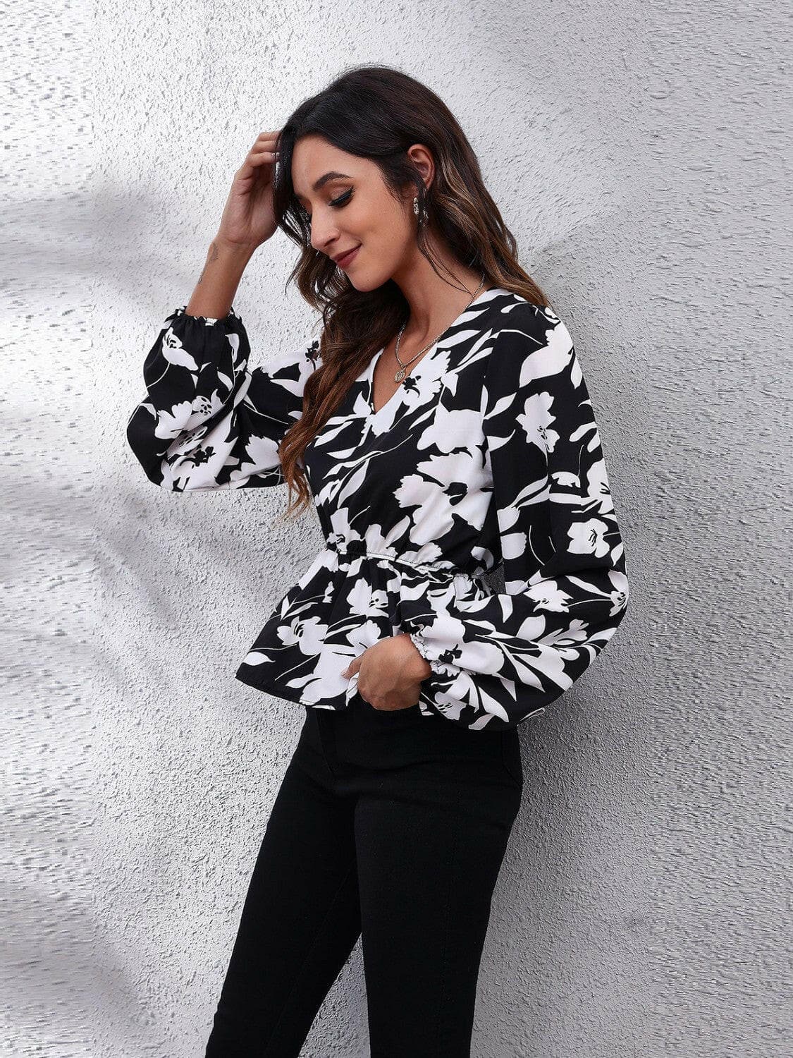 Floral V-Neck Balloon Sleeve Peplum BlouseFloral V-Neck Balloon Sleeve Peplum Blouse
 Indulge in the charm of the Floral V-Neck Balloon Sleeve Peplum Blouse, a fusion of elegance and modernity. Elevate your Love Salve -Neck Balloon Sleeve Peplum BlouseBlouses