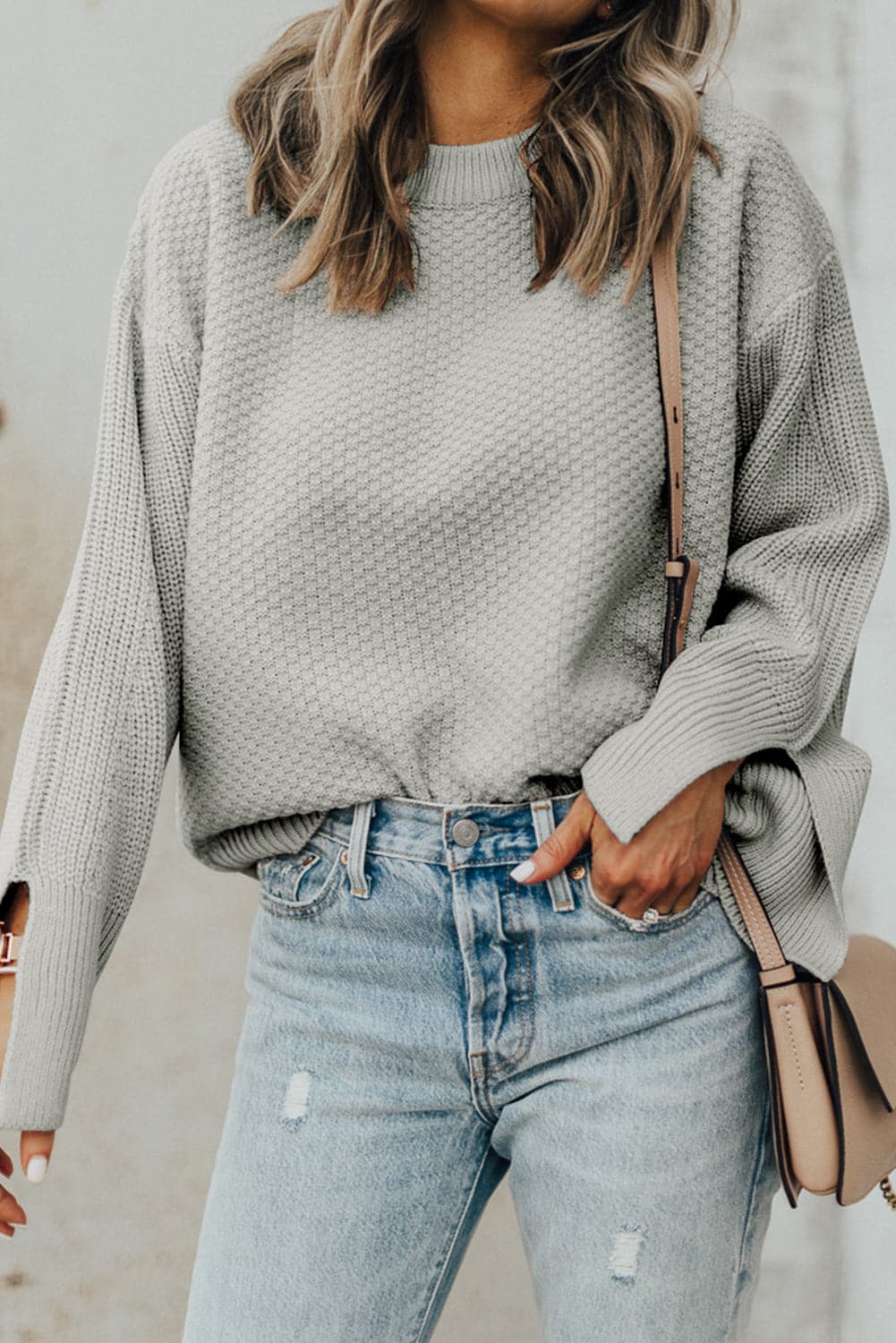 Chic textured long sleeve sweater with stylish slit detail