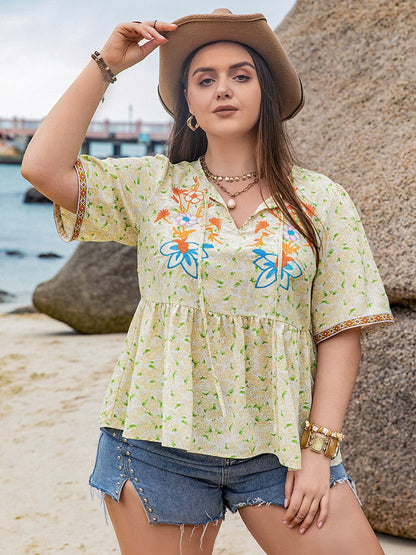 Plus Size Printed Tie Neck Half Sleeve Blouse.