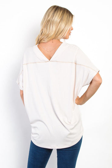 Be Stage Full Size V-Neck Short Sleeve Ribbed Top.