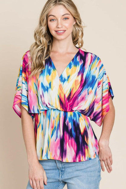 BOMBOM Printed Surplice Peplum Blouse.