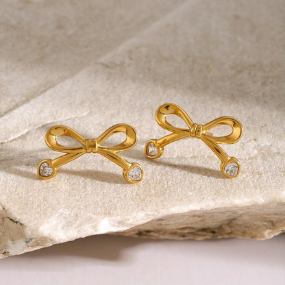 Stainless Steel Inlaid Zircon Bow Earrings.