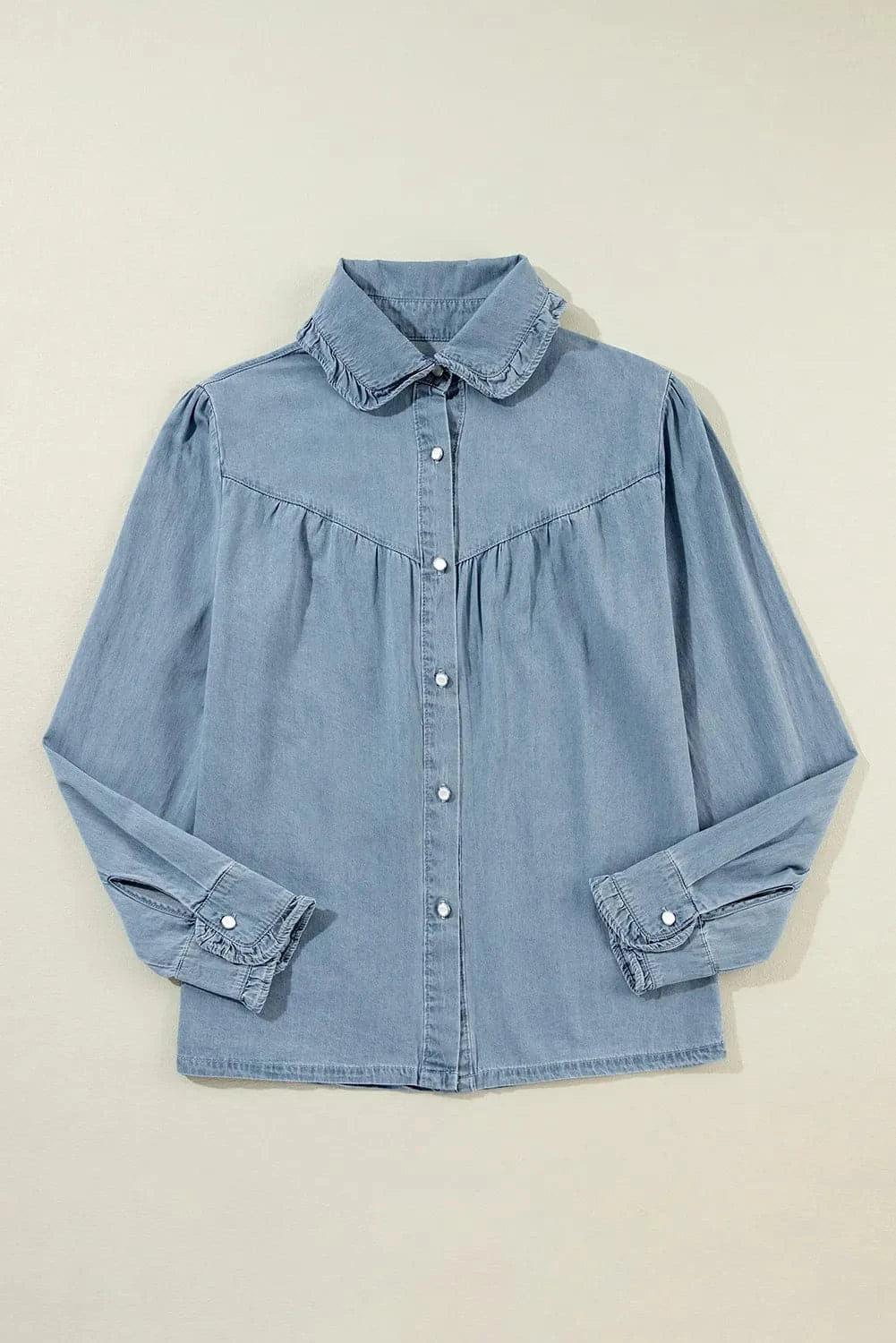 Classic button-up denim shirt with long sleeves