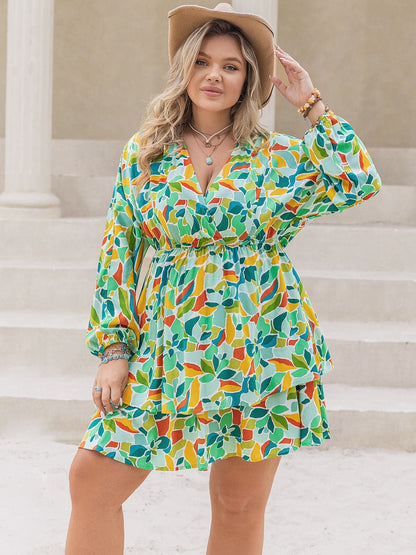 Plus Size Printed Surplice Long Sleeve Mini Dress.