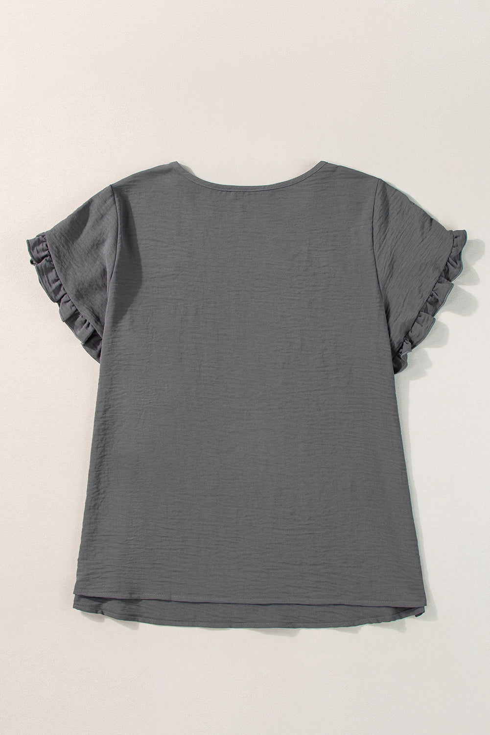 Chic dark grey ruffled plus size top for effortless elegance