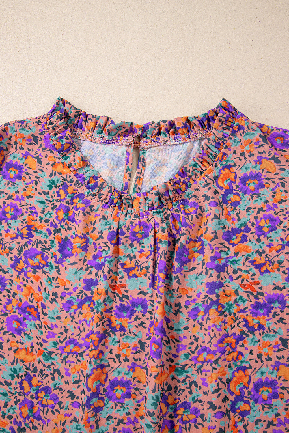 Charming purple floral frilled blouse with shirred cuffs