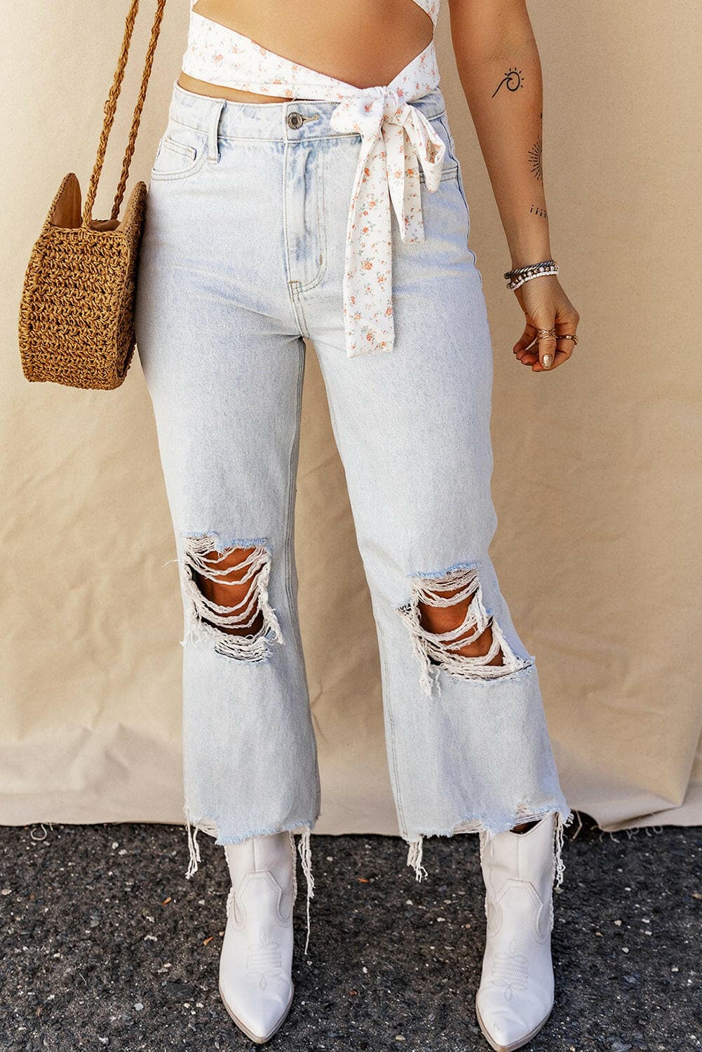 Distressed Denim Jeans with Raw Edge Detail.