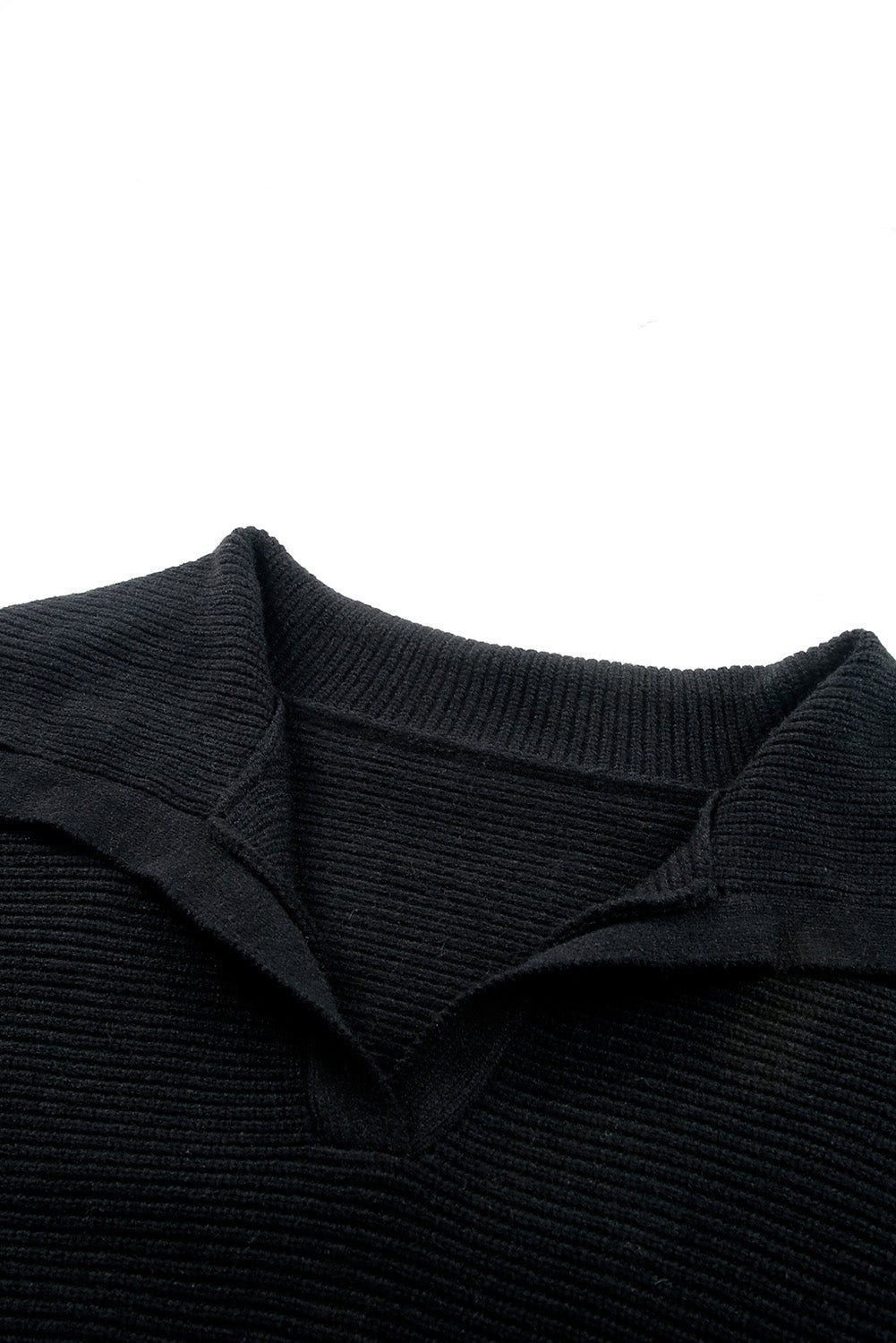 Curvy elegance: Black ribbed knit lapel sweater