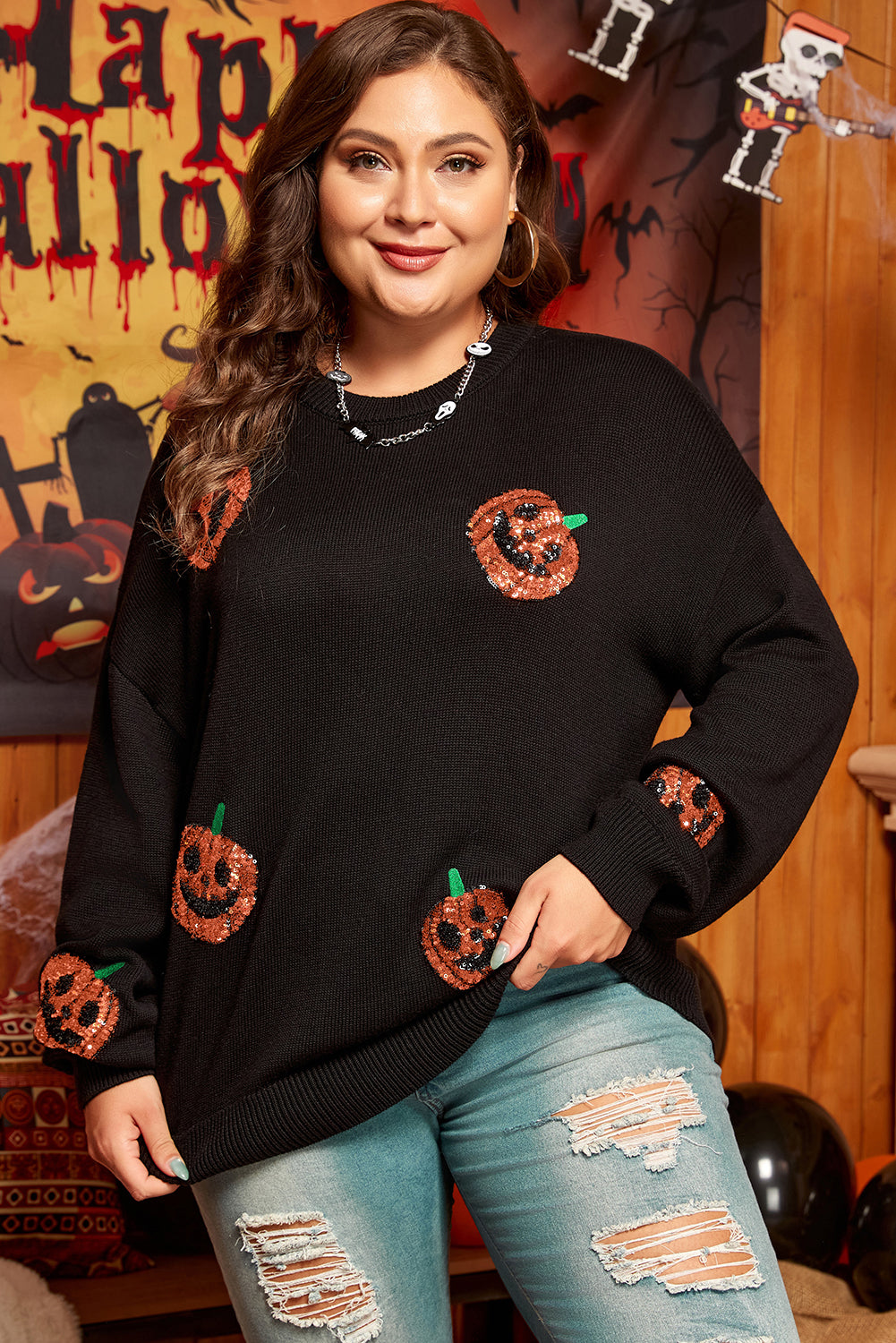 Chic black sequined pumpkin sweater