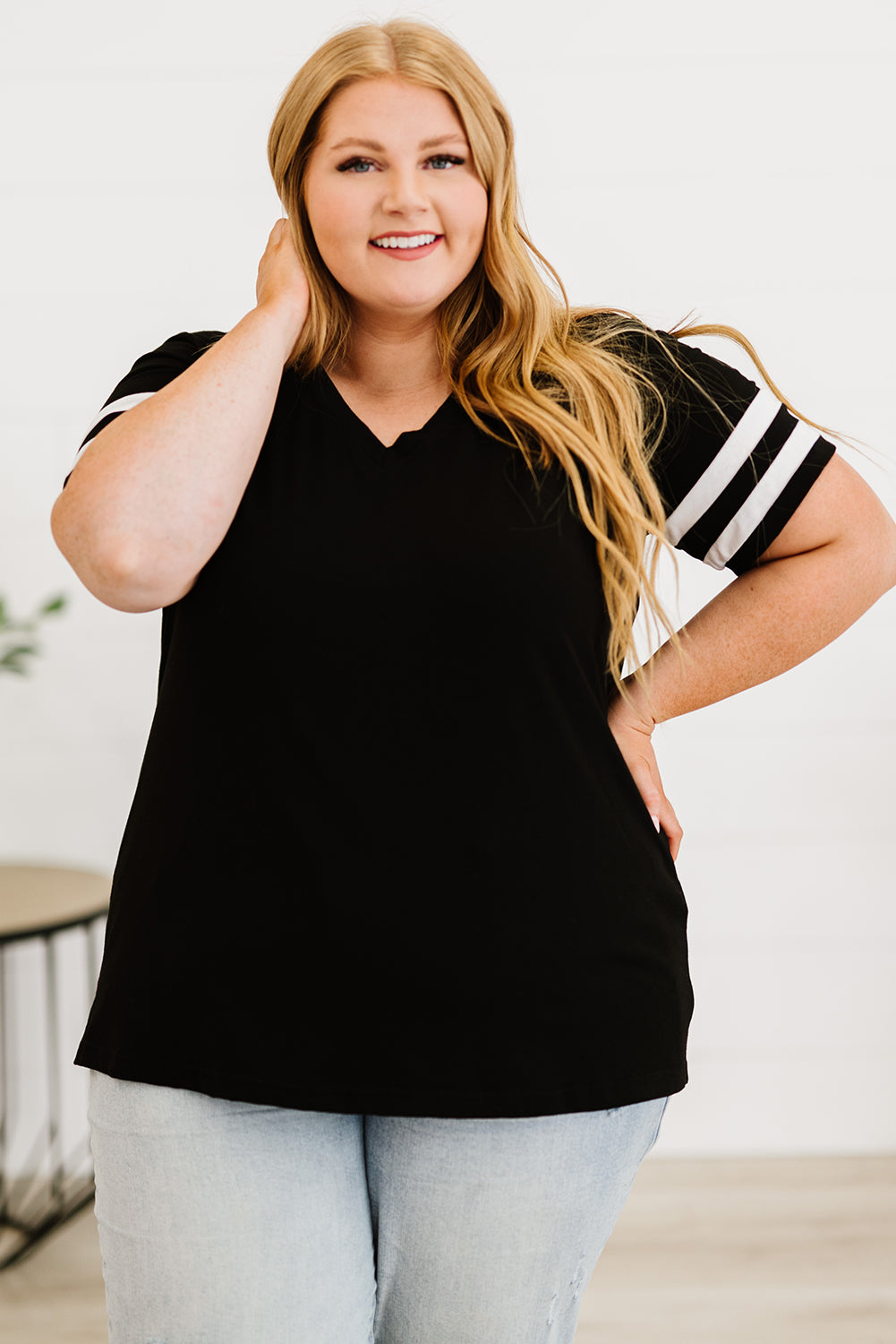 Chic black plus size V-neck tee with striped sleeves