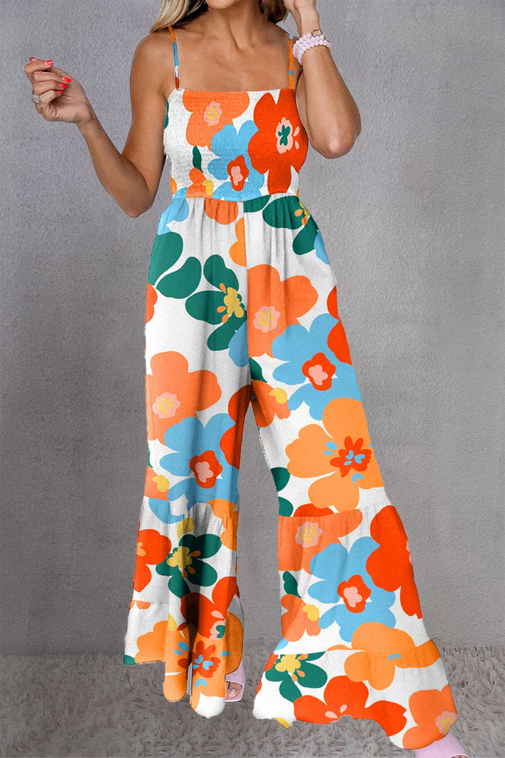 Printed Smocked Spaghetti Strap Jumpsuit.