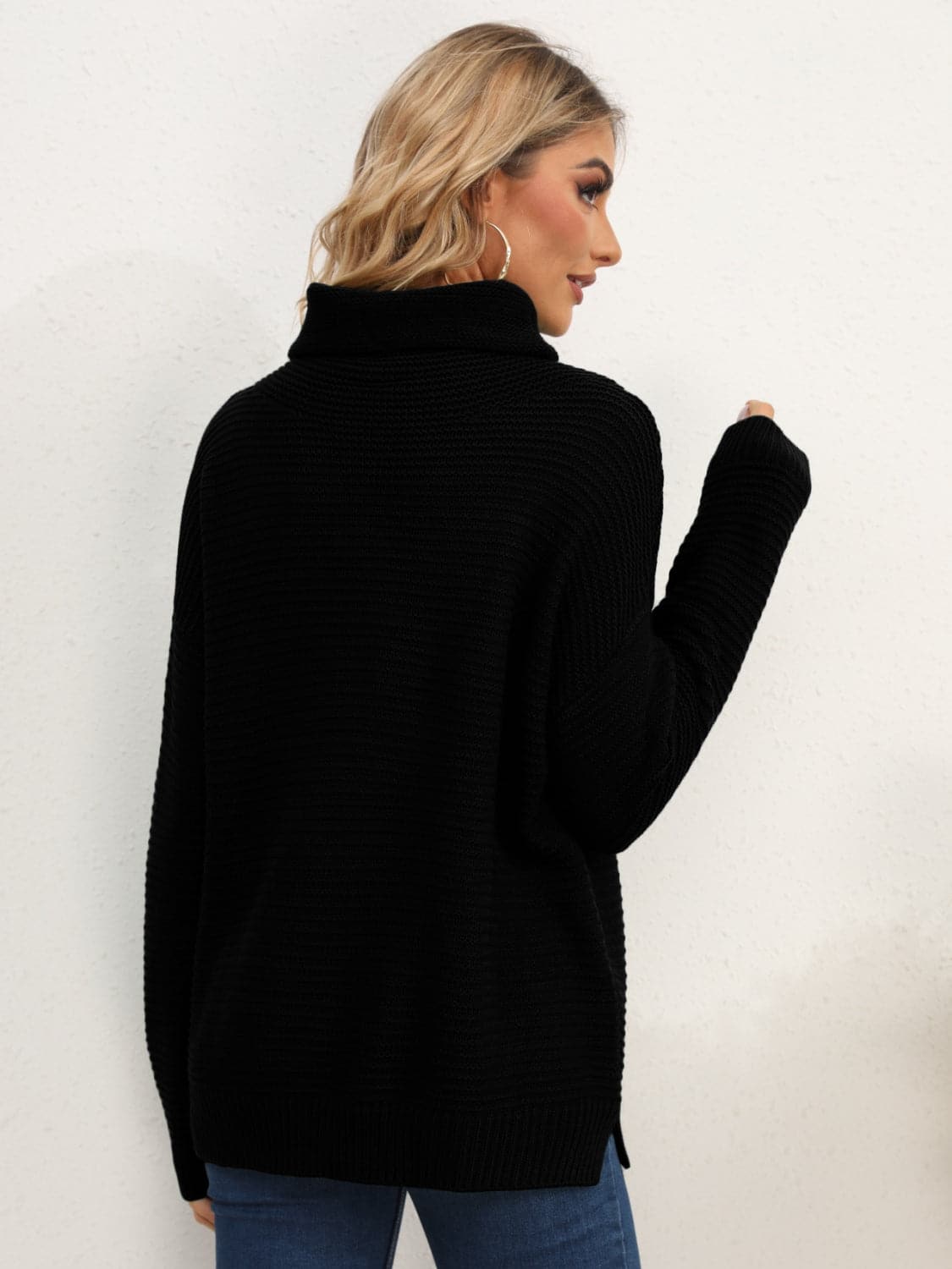 Slit Turtleneck Dropped Shoulder Sweater.