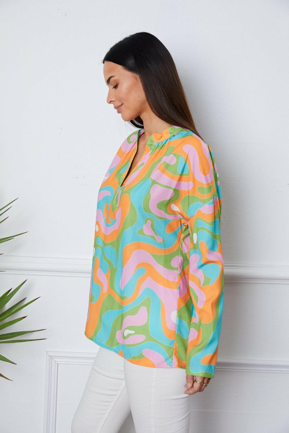 Printed Notched Long Sleeve Blouse.