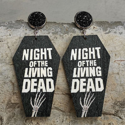 Eerie elegance: coffin-shaped wooden dangle earrings