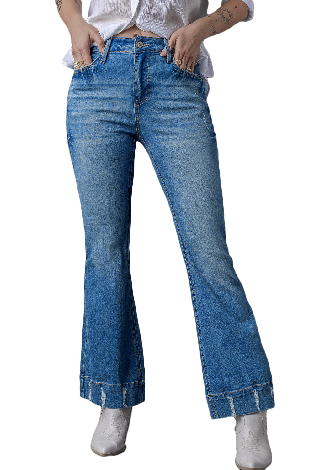 Chic light blue distressed flare jeans for a trendy look