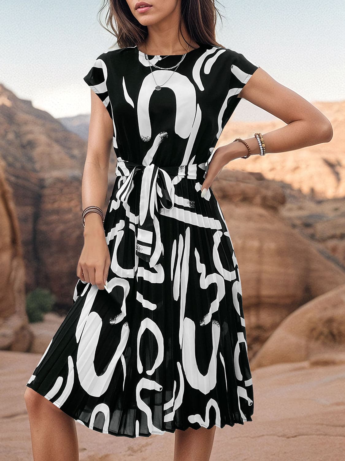 Printed Cap Sleeve Tie Waist Dress.