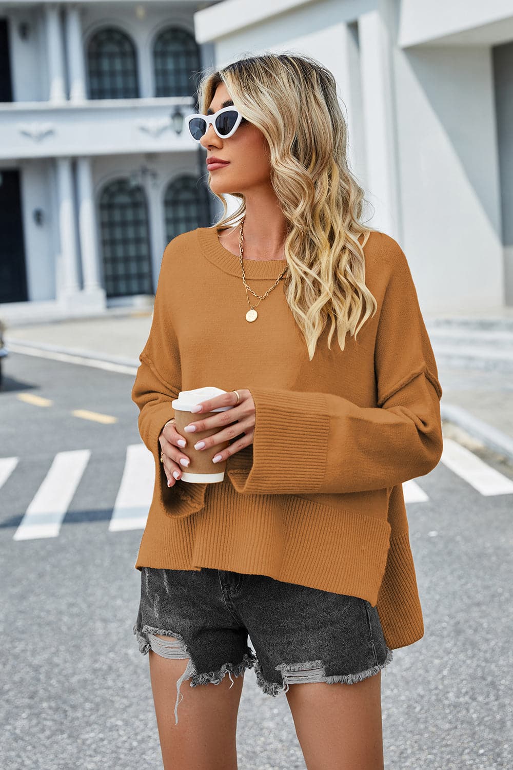 High-Low Slit Round Neck Long Sleeve Sweater.