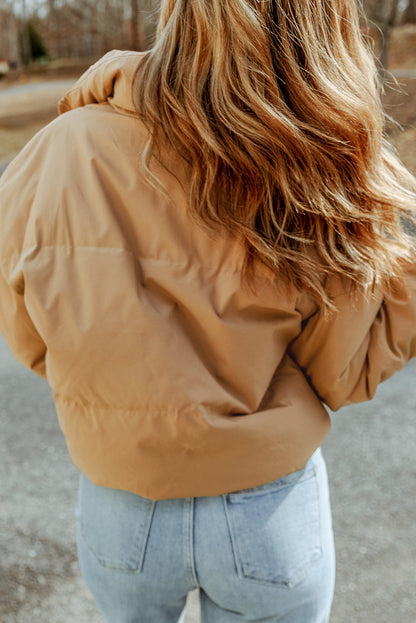 Cozy brown puffer coat with zip pockets