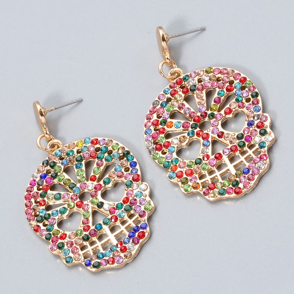 Rhinestone skull earrings in alloy