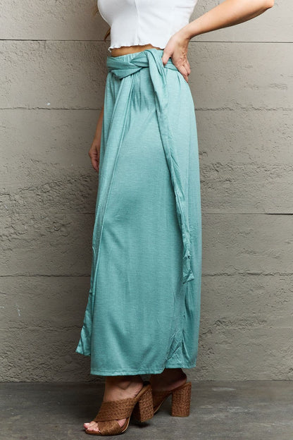 Elevate your elegance with the Ninexis criss cross halter neck maxi dress