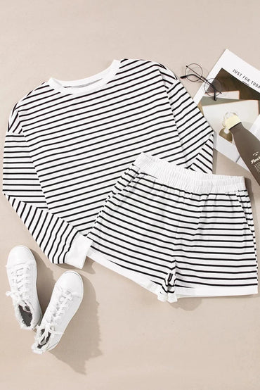 Striped Round Neck Long Sleeve Top and Shorts SetFeatures: Pocketed
Number of pieces: Two-piece
Stretch: Slightly stretchy
Material composition: 50% cotton, 47% polyester, 3% elastane
Care instructions: Machine wasLove Salve Striped Round Neck Long Sleeve TopTwo-Piece Sets