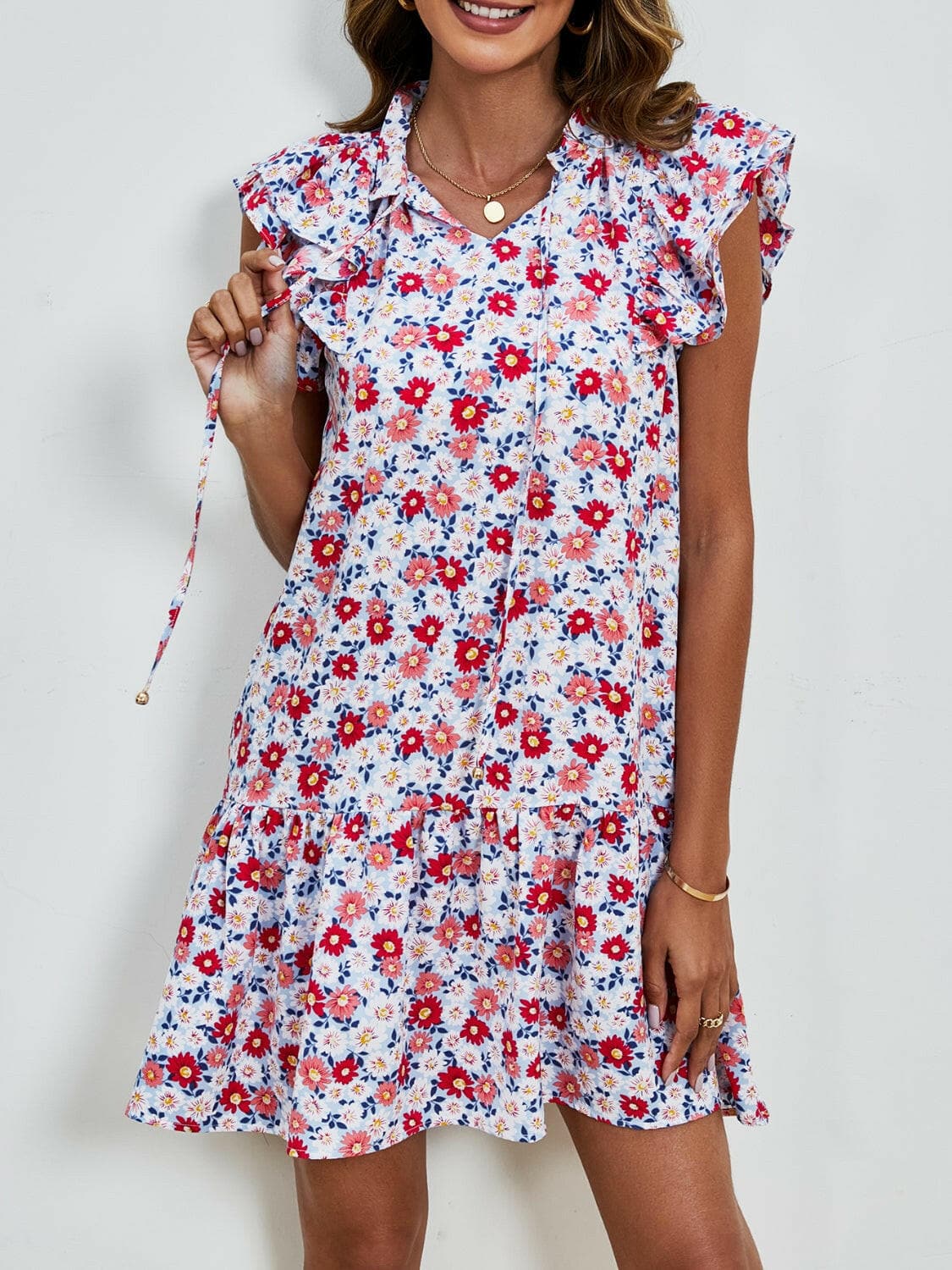 Tied Floral Cap Sleeve Mini Dress.