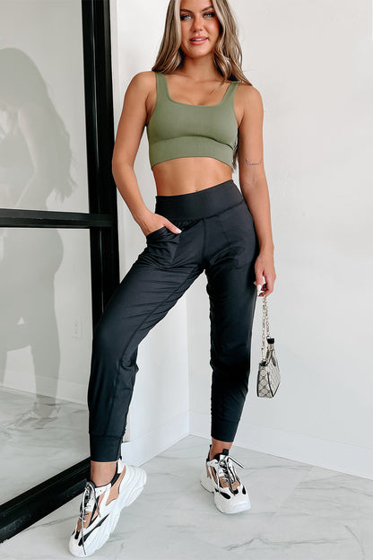 Modern high-waisted joggers with exposed seams and pockets