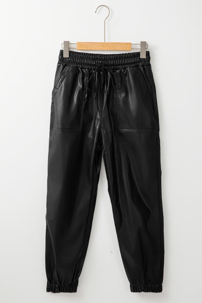 Chic black faux leather joggers with smocked waist and drawstring detail