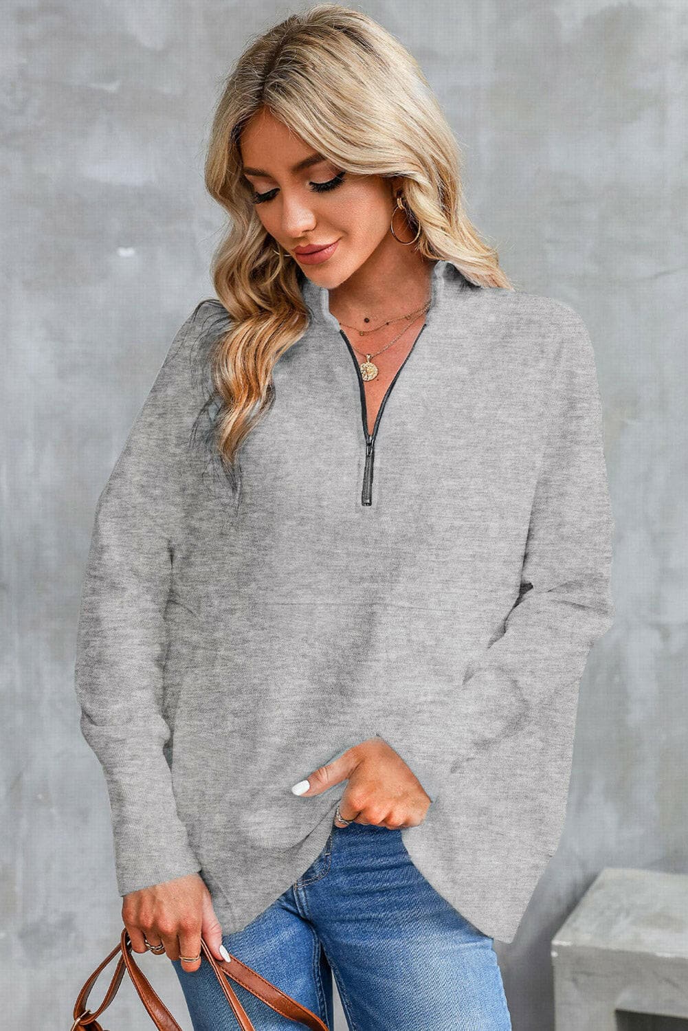 Half Zip Pocketed Dropped Shoulder Sweatshirt.