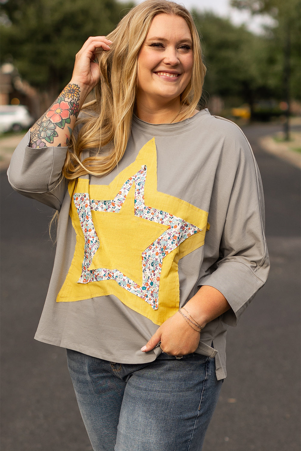 Chic medium grey floral star patch top with 3/4 sleeves in plus sizes