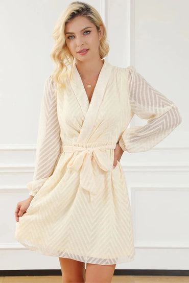 Surplice Long Sleeve Mini Dress.