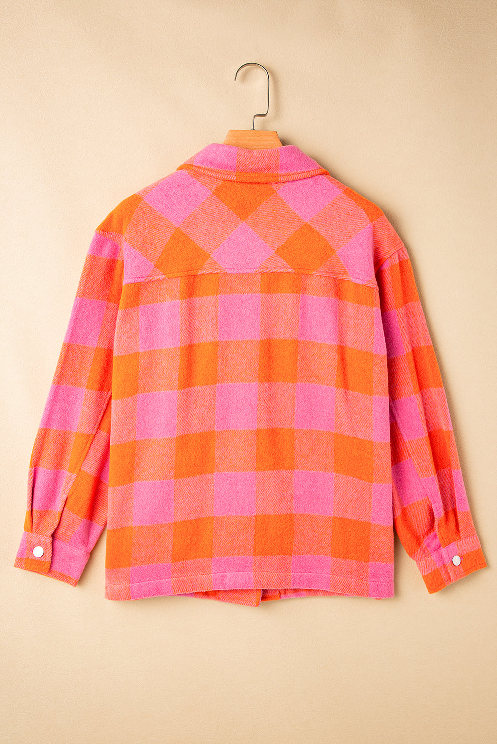 Orange plaid button-up jacket with chest pockets and turn-down collar