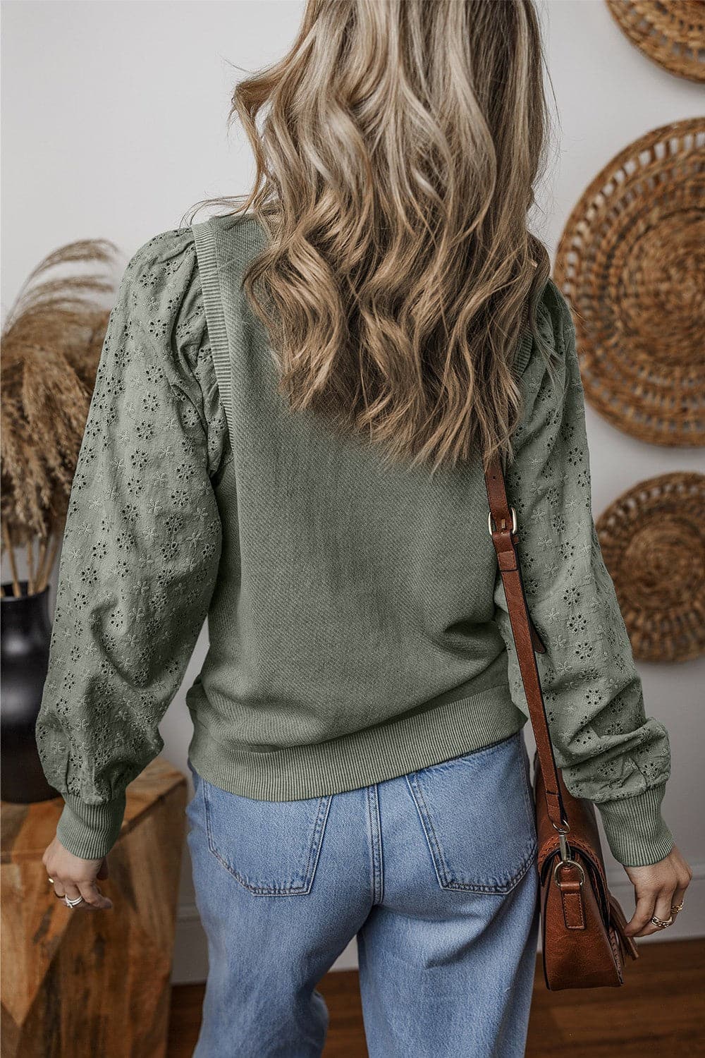 Eyelet Round Neck Long Sleeve Sweatshirt.