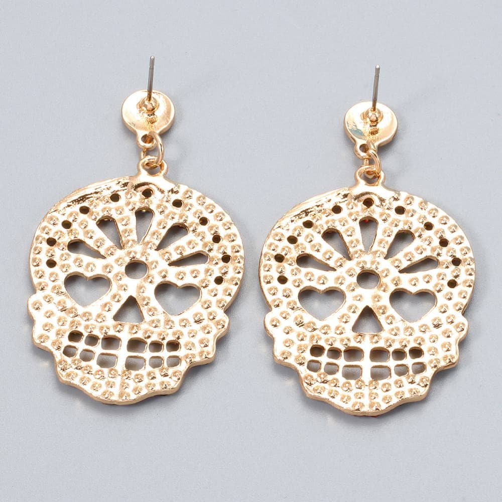 Rhinestone skull earrings in alloy