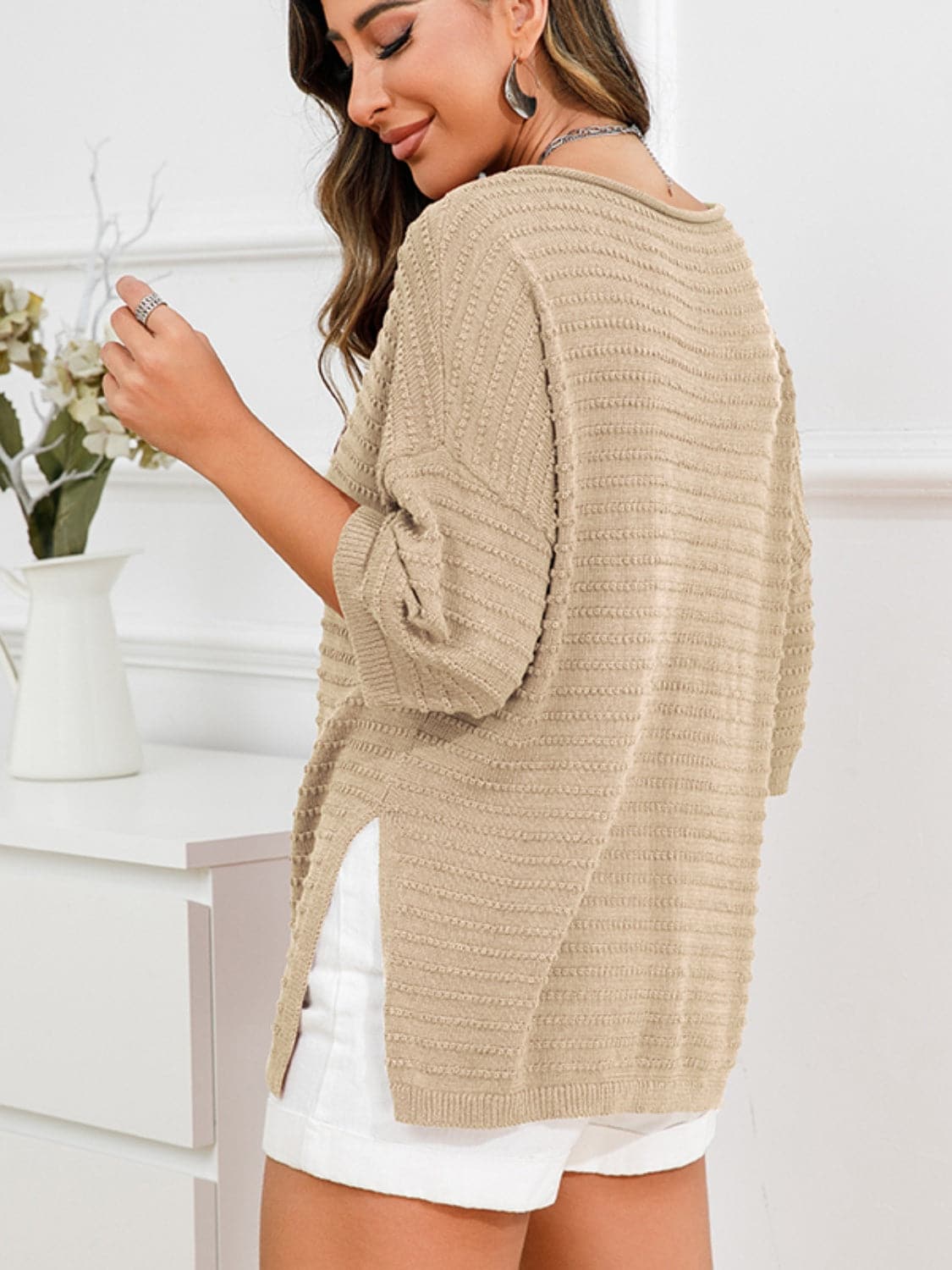 Rolled Round Neck Dropped Shoulder Slit Sweater.