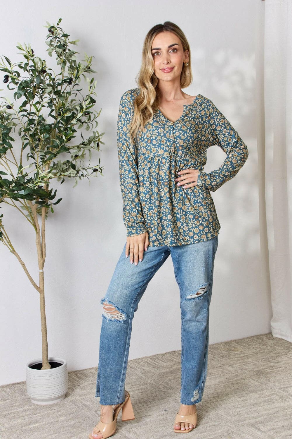 Heimish Full Size Floral Half Button Long Sleeve Blouse.