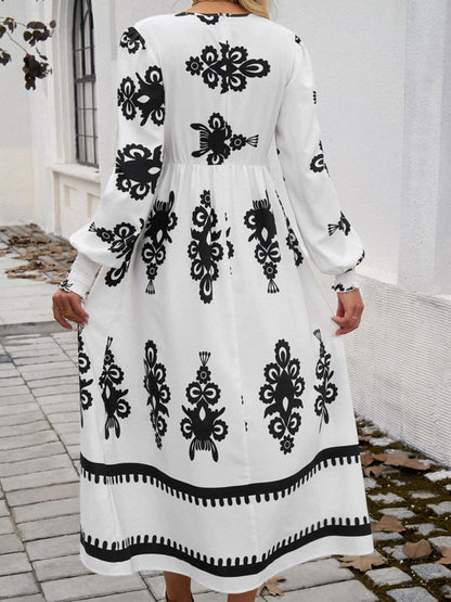 Chic printed surplice midi dress with lantern sleeves