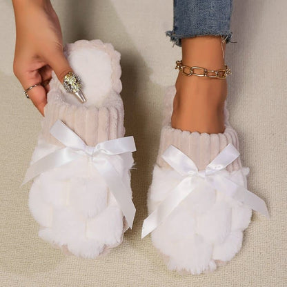 Chic bow-accented contrast slippers