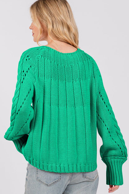 Cozy cable knit oversized sweater with boat neckline