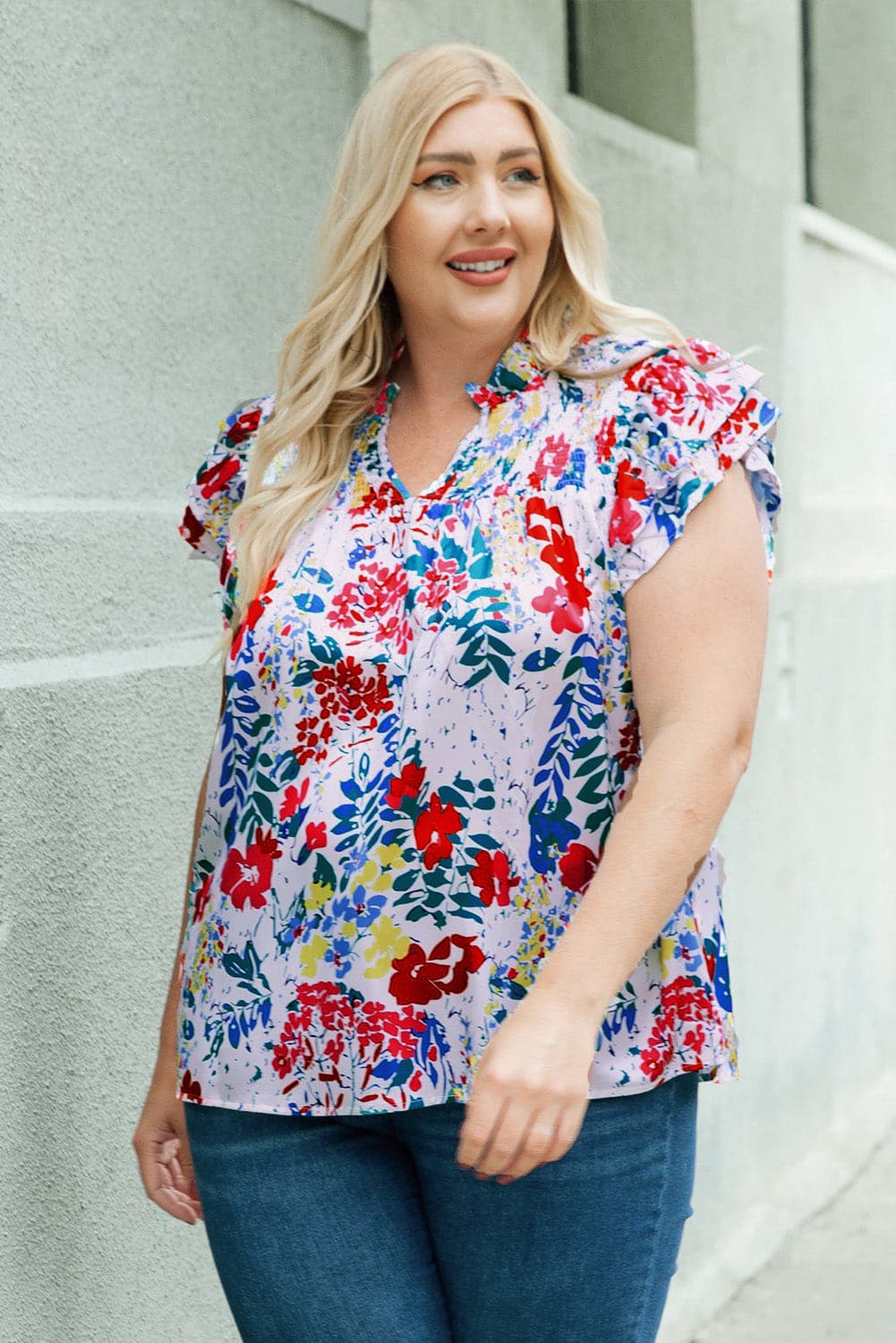 Plus Size Floral Smocked Flutter Sleeve Blouse.