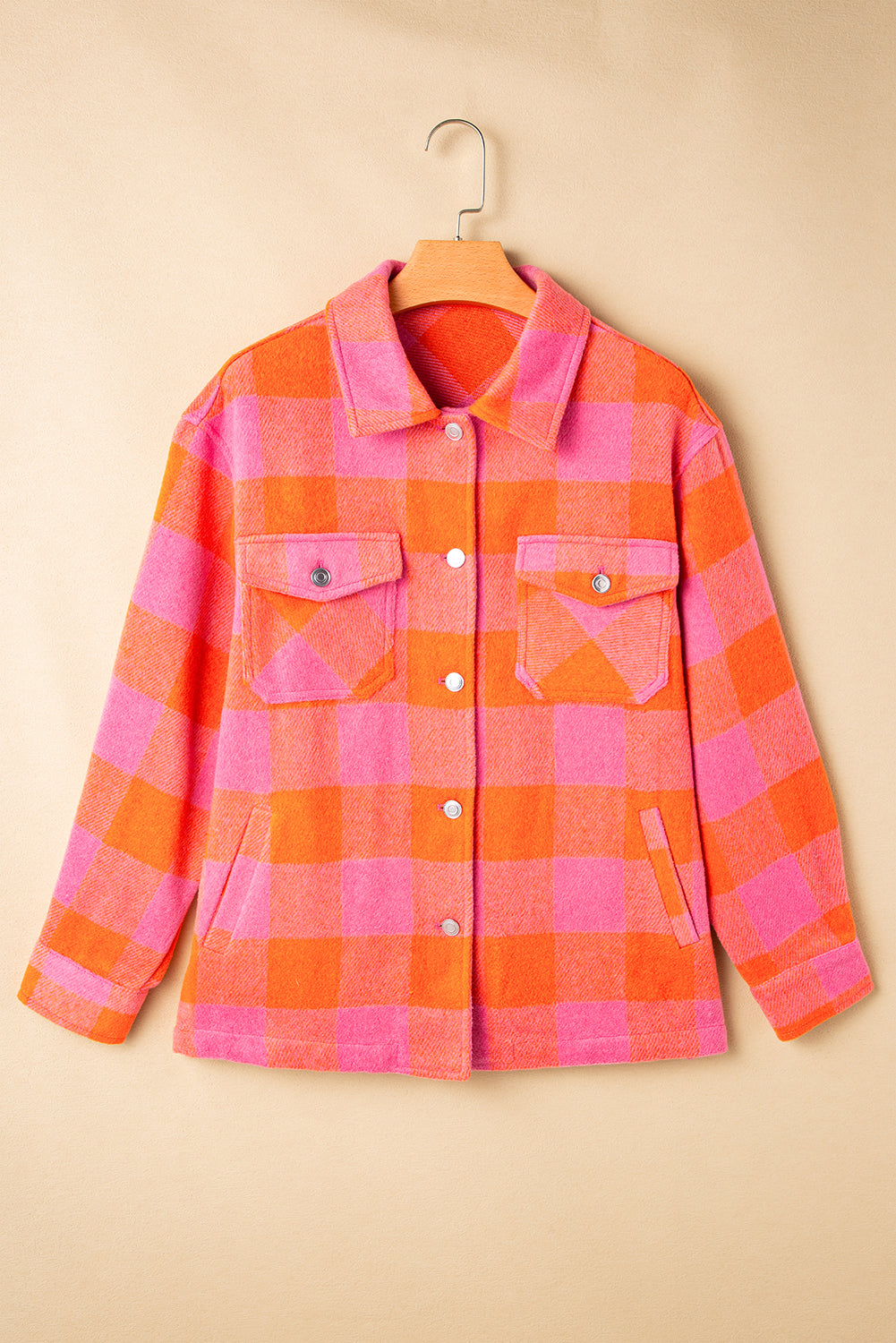 Orange plaid button-up jacket with chest pockets and turn-down collar