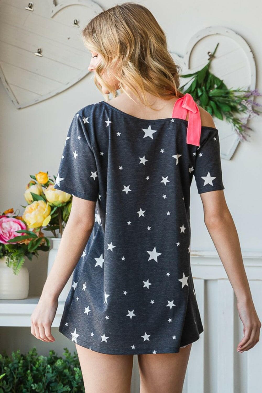 Heimish Full Size Star Print Asymmetrical Neck Short Sleeve Top.