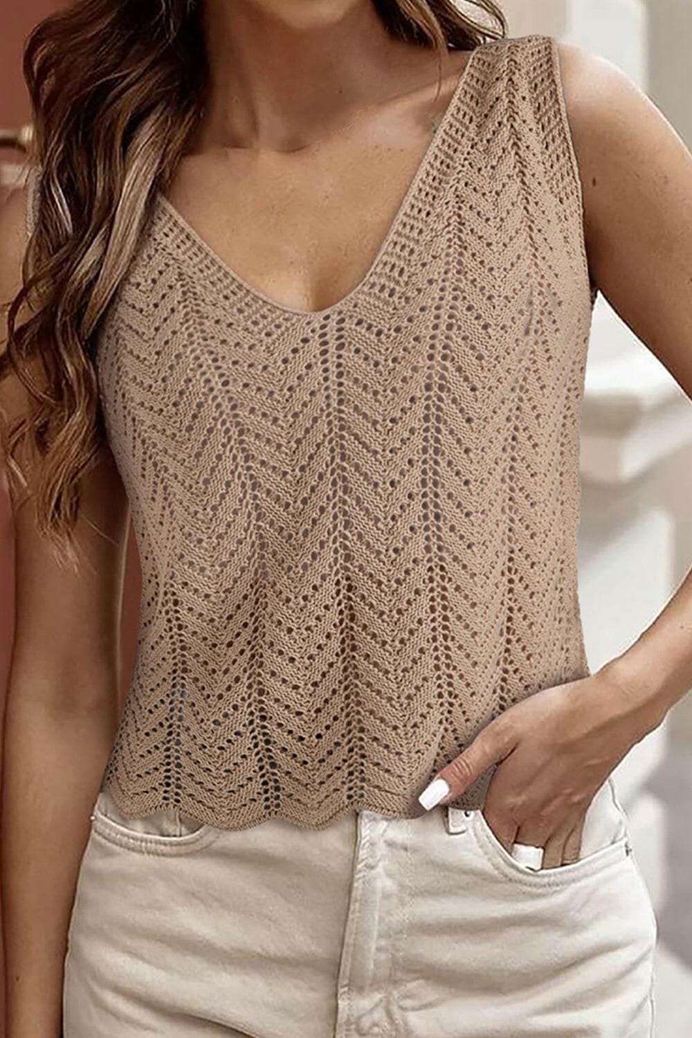 Openwork V-Neck knit VestOpenwork V-Neck Knit Vest
 Embrace sophistication with the intricate openwork design of the Openwork V-Neck Knit Vest. This vest combines elegance with comfort, makiLove Salve -Neck knit Vestjust arrived