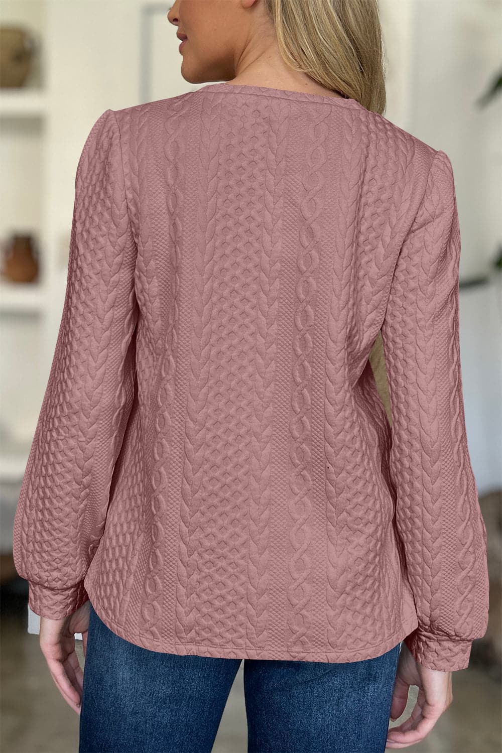 Textured Round Neck Long Sleeve Sweatshirt.