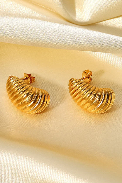 Seashell-inspired spiral stud earrings for elegant charm