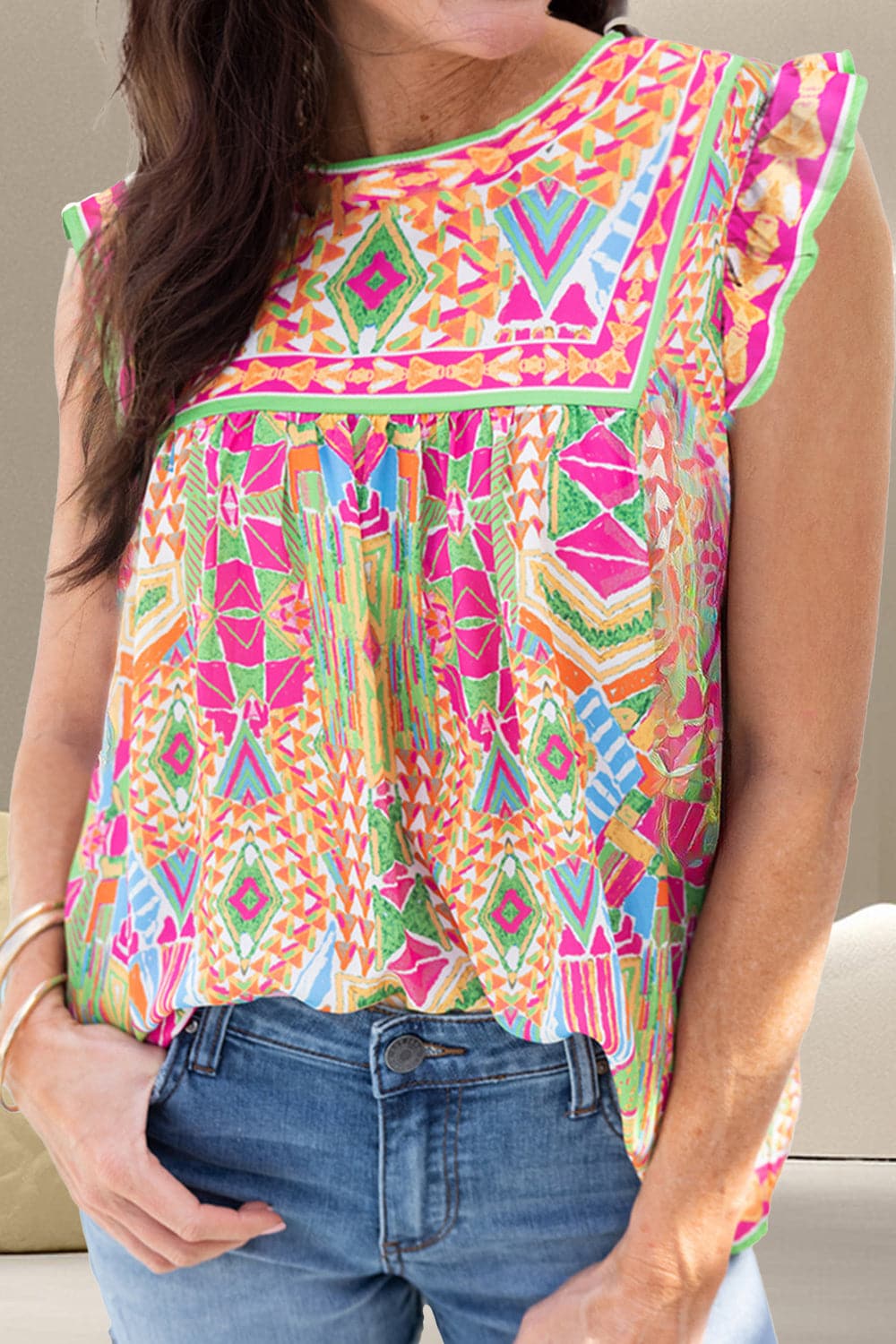 Ruffled Printed Round Neck Cap Sleeve Blouse.