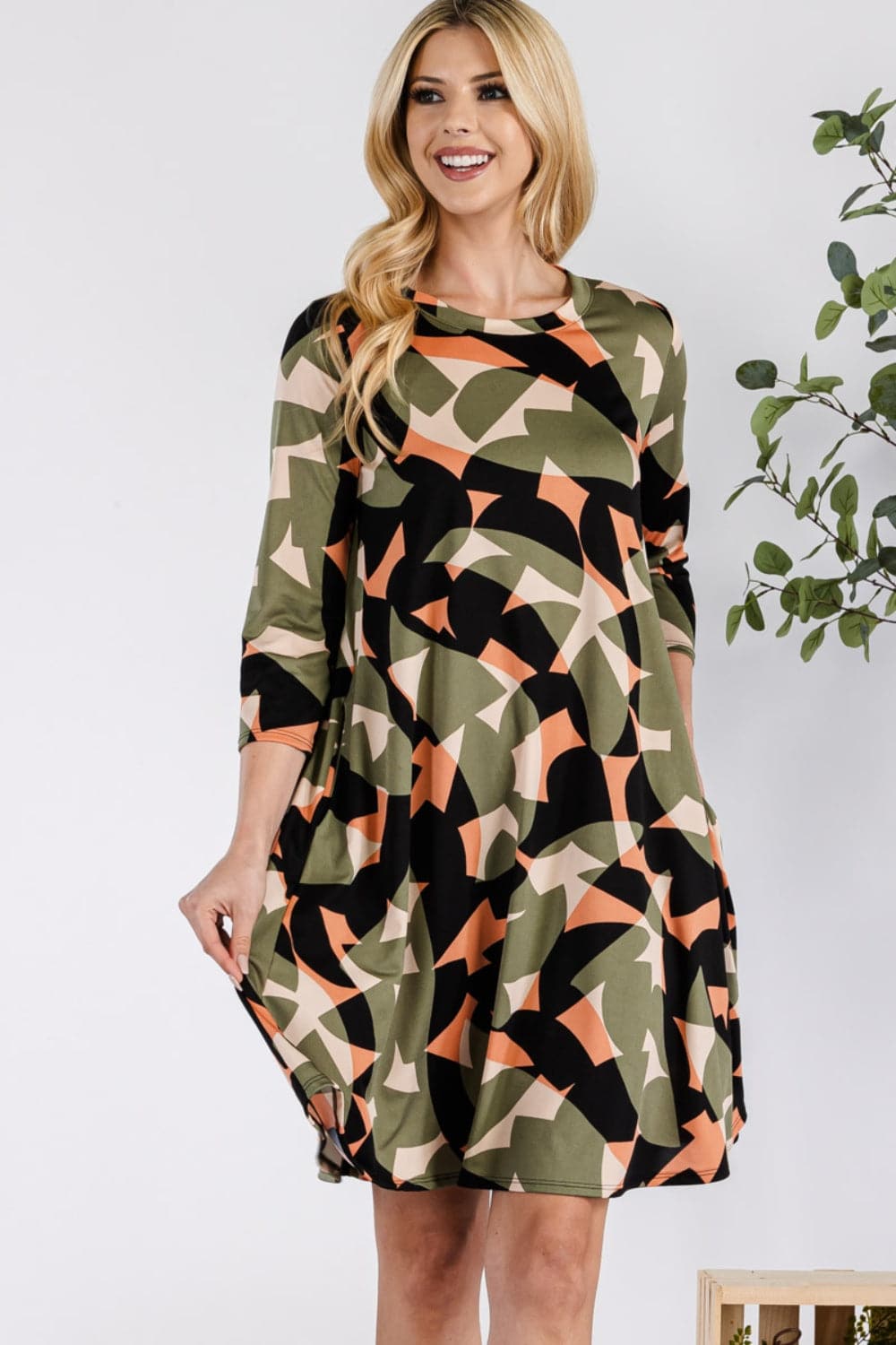 Celeste Full Size Geometric Round Neck Dress with Pockets.