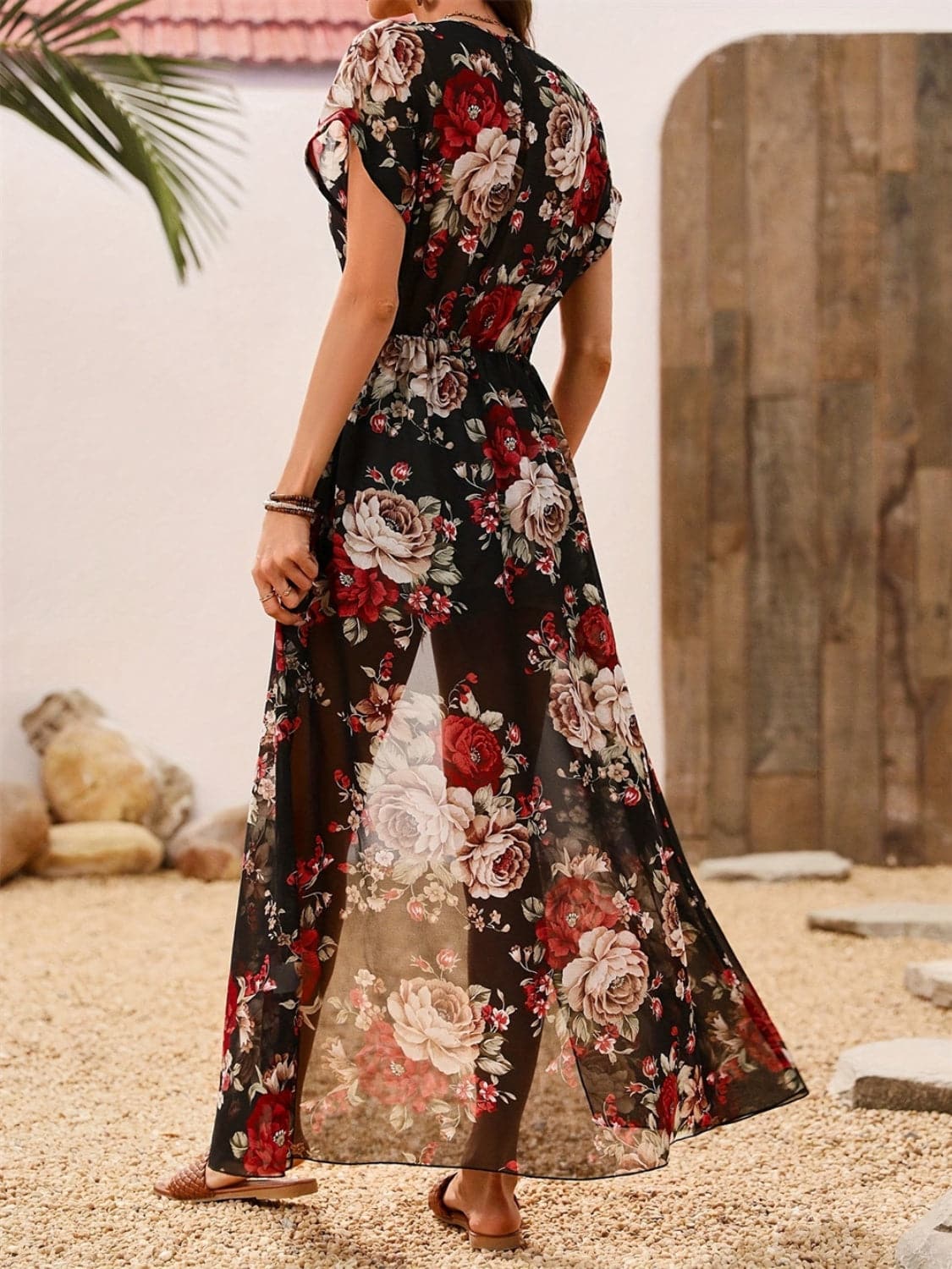 Sheer floral blouse with slit