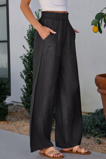 Chic black frilled smocked high waist wide leg jeans with side pockets