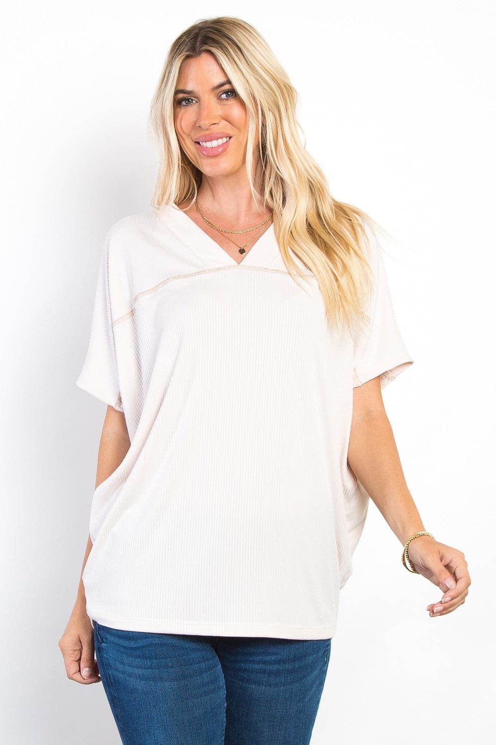 Be Stage Full Size V-Neck Short Sleeve Ribbed Top.